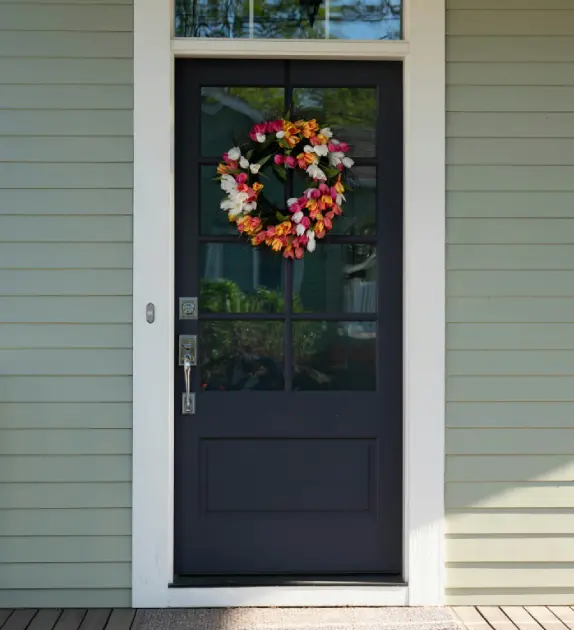 Residential front door with deadbolt lock.