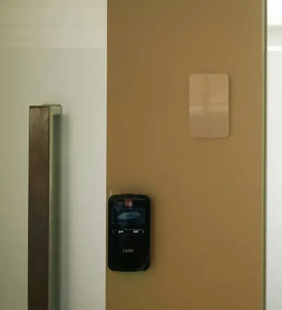 Office building door with key card access lock.